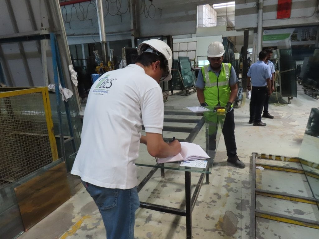 BES façade engineers inspecting glass panels during a glass façade inspection