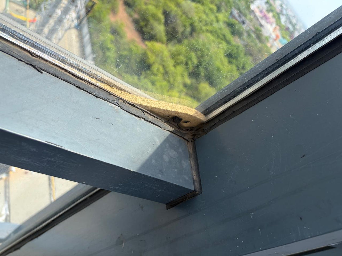 Damaged glazing seal and gasket at glass façade frame connection